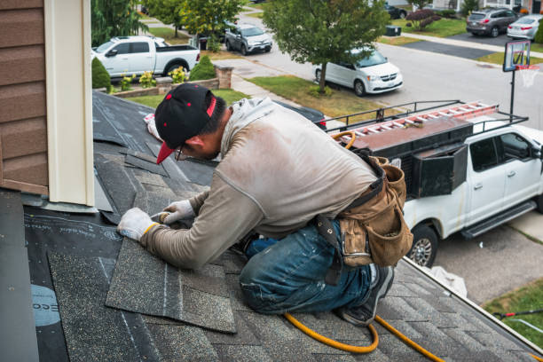 Professional Gutter Installation technician working in Redmond, OR